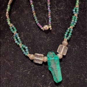 2/35 or $25💚 Hand-beaded, handmade necklace featuring green crystal centrepiece